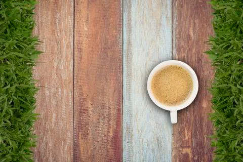 Top view of a cup of coffee on background old panels Stock Photos