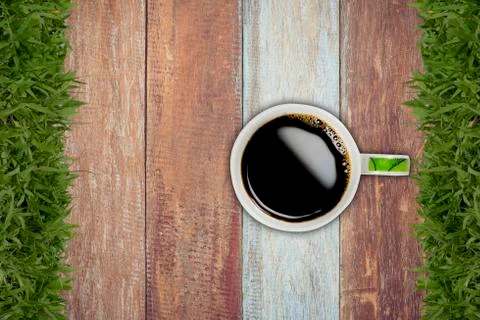 Top view of a cup of coffee on background old panels Stock Photos