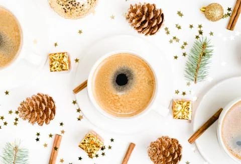 Top view of a cup of coffee, isolate on white with Christmas toys, pine cones Stock Photos