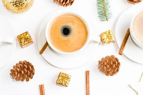 Top view of a cup of coffee, isolate on white with Christmas toys, pine cones Stock Photos