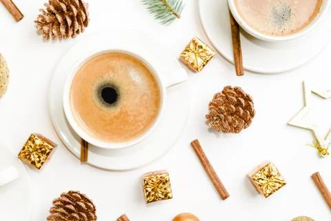 Top view of a cup of coffee, isolate on white with Christmas toys, pine cones Stock Photos