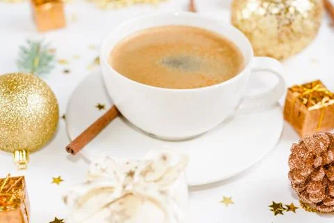 Top view of a cup of coffee, isolate on white with Christmas toys, pine cones Stock Photos