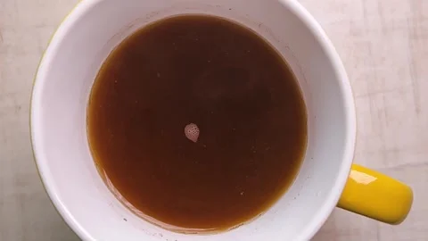 Top View of a Cup Filled with Rich Brown Liquid Vidéo 278219451