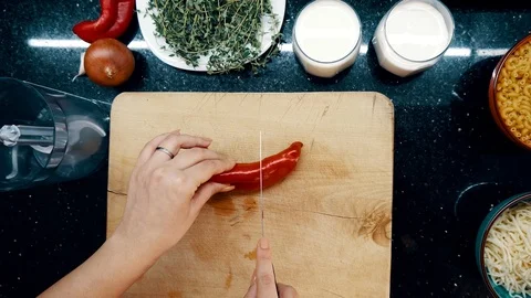 Top view cutting pepper on board with chef hands. Stock Footage 122559631