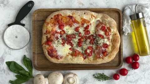 Top view of cutting a pizza on slices. Stop motion animation Stock Footage 160898333
