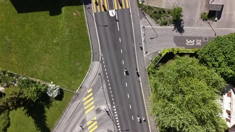 Top view of cyclists riding on car free road during public event 動画素材 334027547