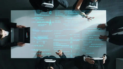 Top view of data analysts wearing VR headset stands coding program. Stock Footage 278758863