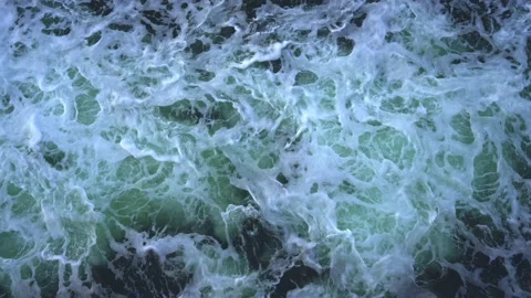 Top view, from the deck on the waves and foam that a passenger ship makes in the Stock Footage 238510805