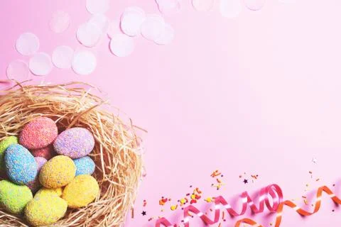 Top view of decorated eggs in a nest. Stock Photos