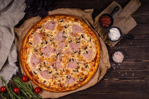 Top view of delicious and crispy pizza. Stock Photos