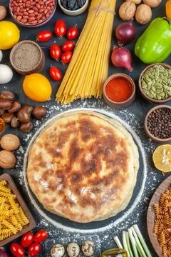 Top view delicious flapjacks with different ingredients seasonings and past.. Stock Photos