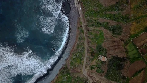 Top view of a deserted black volcanic beach. Coast of the island of Tenerife Stock Footage 104960058