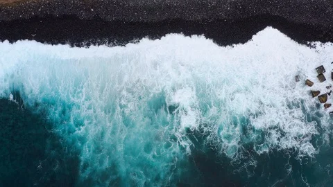 Top view of a deserted black volcanic beach. Coast of the island of Tenerife Stock Footage 111460600