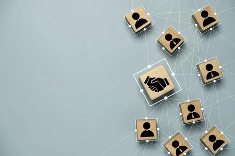 Top view design on blue background of Hand shaking which print screen on wo.. Stock Photos