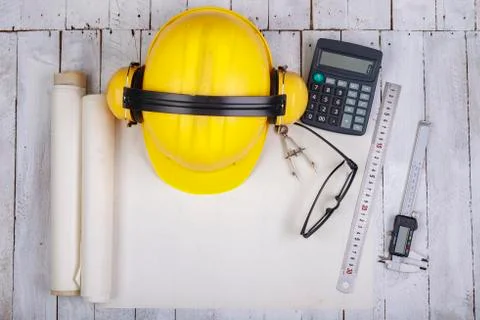 Top view of a design engineer desk. Accessories for building design work on w Stock Photos