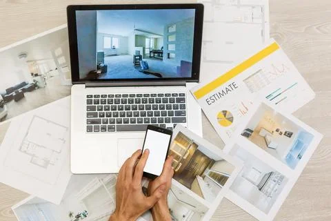 Top view of Designer hand working with laptop computer on wooden desk as Stockfoto's