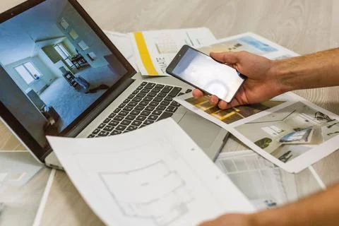Top view of Designer hand working with laptop computer on wooden desk as Foto stock