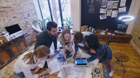 Top View of Designers Discussing Interior Project Stock Footage 115463077