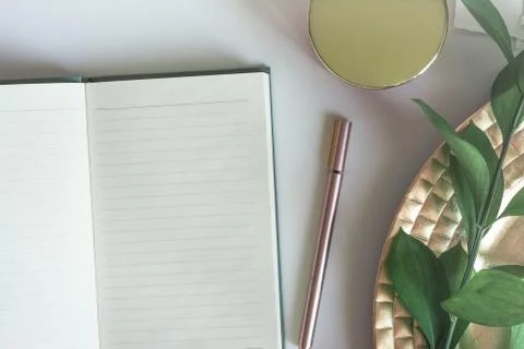 Top view desktop with notebook copy space leaves Stock Photos