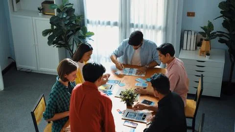Top view of developer team designing Ux Ui design for mobile phone. Convocation. Stock Photos