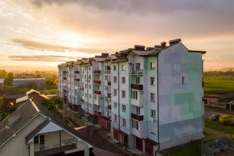 Top view of developing city landscape. Apartment building and suburb house ro Stock Photos