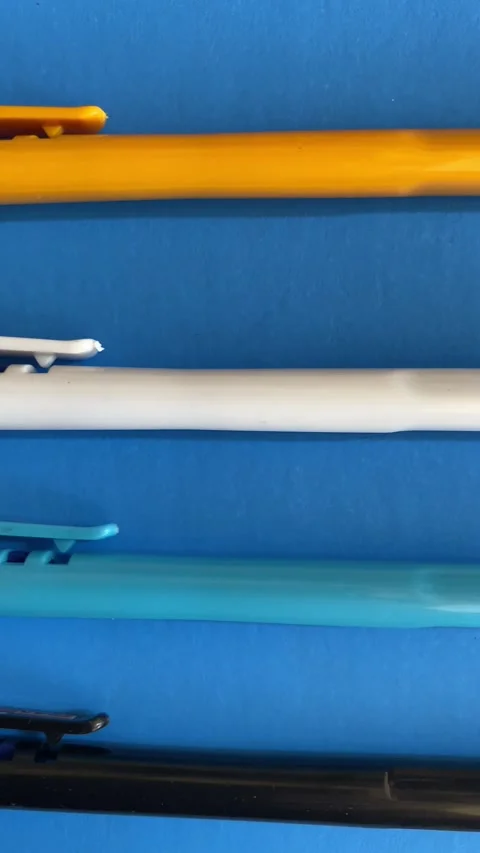 Top View of Different Color Ball Pens Stock Footage 293949757