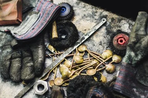 Top view of different goldsmiths tools on the jewelry workplace. Aerial view of Stock Photos