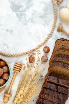 Top view different ingredients eggs dark bread milk nuts and jelly on white.. Stock Photos
