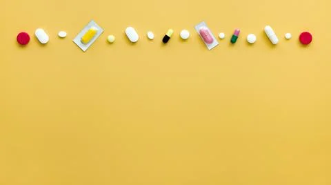 Top view different pills row with copy space. High quality and resolution Stock Photos
