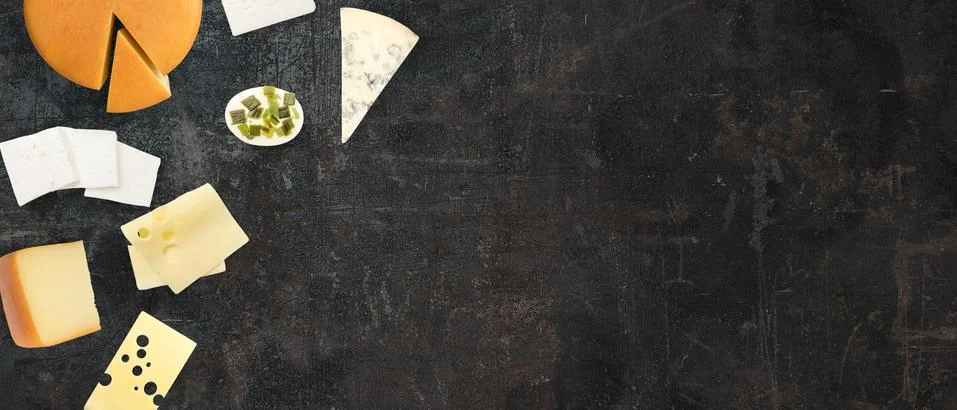 Top view of different types of cheese in a dark background. Isolated types of Stock Photos