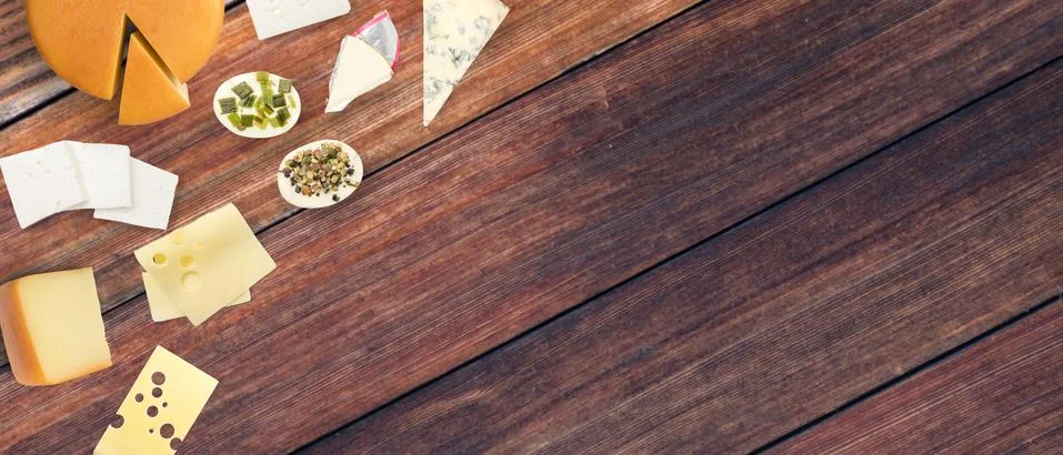 Top view of different types of cheese in a wooden background. Isolated types  Stock Photos