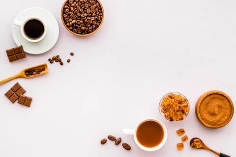 Top view of diffetent varieties of coffee beans with hot drink, top view Stock Photos