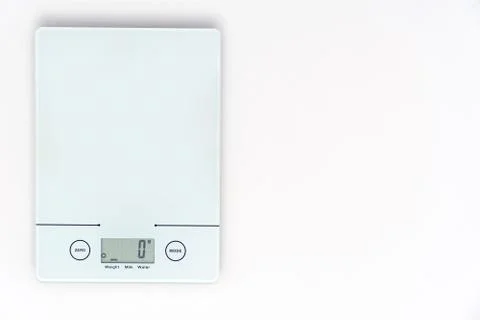 Top view of digital kitchen scale on white Foto stock