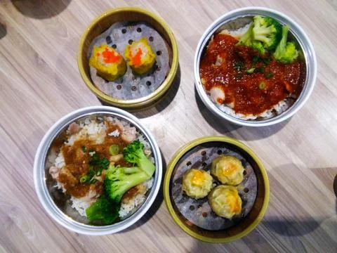 Top view of Dim Sum and chinese rice dish. Chinese spicy chicken rice. Stock Photos