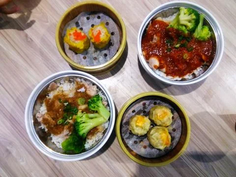 Top view of Dim Sum and chinese rice dish. Chinese spicy chicken rice. Stock Photos