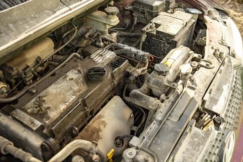 Top view of the dirty engine of an old car in need of repair. Car engine main Stock Photos