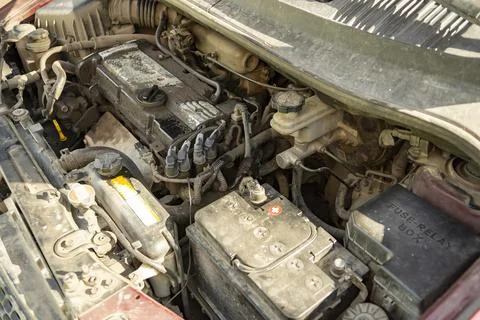 Top view of the dirty engine of an old car in need of repair. Car engine main Stock Photos