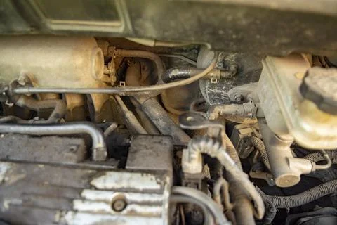 Top view of the dirty engine of an old car in need of repair. Car engine main Stock Photos