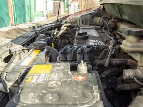 Top view of the dirty engine of an old car in need of repair. Car engine main Stock Photos