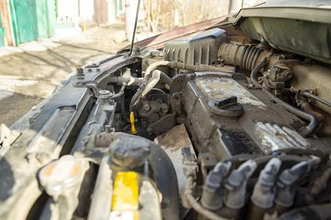 Top view of the dirty engine of an old car in need of repair. Car engine main Stock Photos