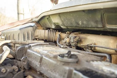 Top view of the dirty engine of an old car in need of repair. Car engine main Stock Photos