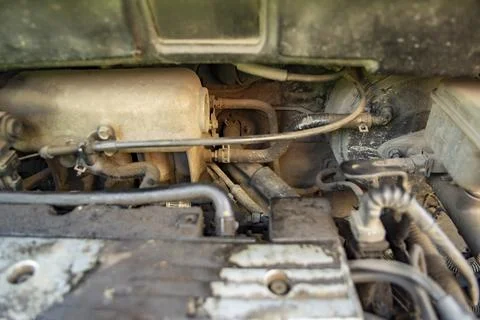 Top view of the dirty engine of an old car in need of repair. Car engine main Stock Photos