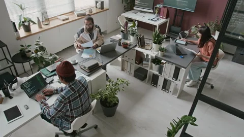 Top View of Diverse Team of Software Developers Collaborating on Project Stock Footage 285709999