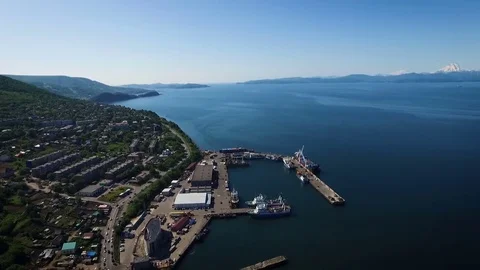 Top view of the dock in the Bay near the city. Cargo Ships with containers Stock Footage 84745657