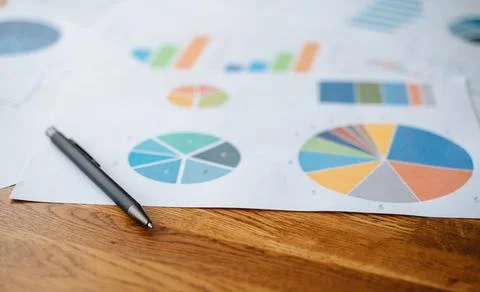 Top view documents with analytics data on table. Stock Photos