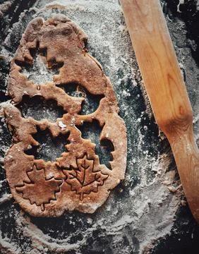 Top view of the dough in which the gingerbread figures are cut. The dough lie Stock Photos