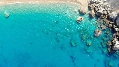 Top view down to the beautiful clean beach without people. Video stock 121579040