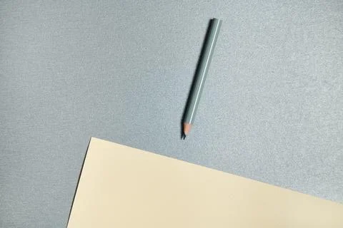 Top view of drawing tools on gray background. Gray color pencil and yellow de Stock Photos