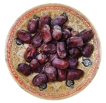Top view of dried dates on brass indian plate top view of dried dates on b... Foto stock