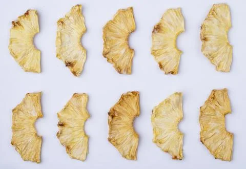 Top view of dried pineapple slices isolated on white background Stock Photos